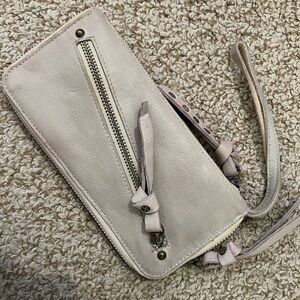 Free people distressed wristlet